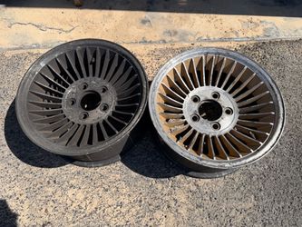 Two 15 inch turbine wheels, 5 on 4.75 lugs original Chevrolet stamp