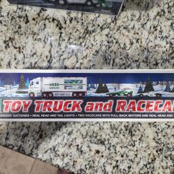 New Hess Toy Truck And Racecars. 