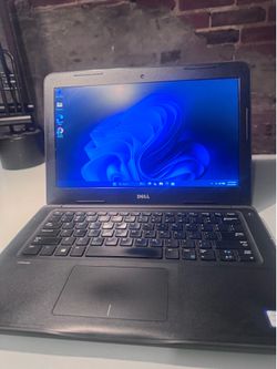 15 inch Dell  laptop with 30 day warranty free delivery in the city