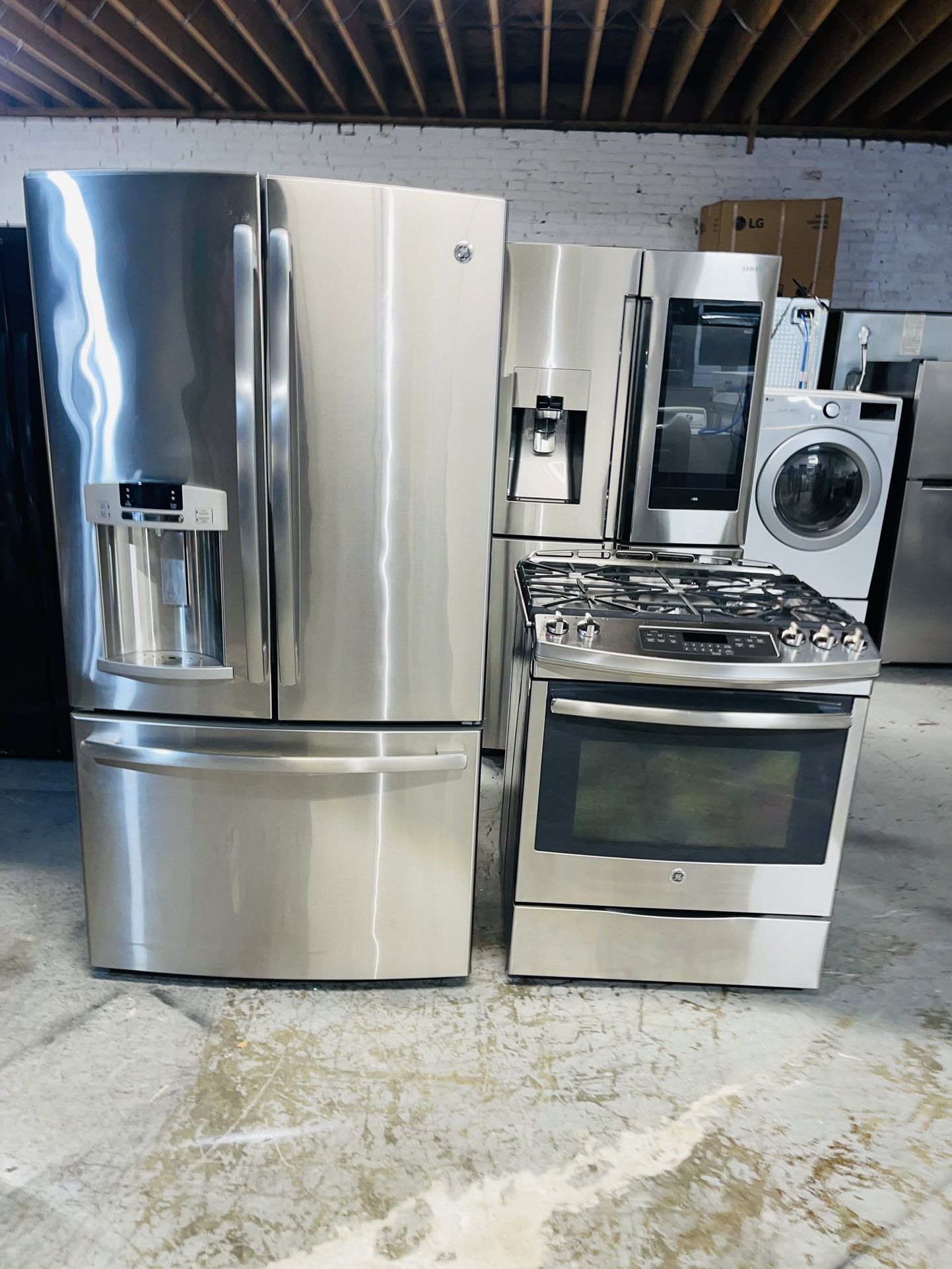 GE refrigerator 36X69X29 and gas stove. Stainless steel. Includes a receipt for a 90-day warranty.