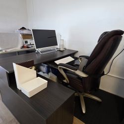 Desk with keyboard tray, shelves and filing drawer.
