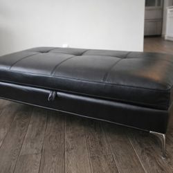 Rooms To Go Leather Ottoman Size: 61 width x 31deep x18 height