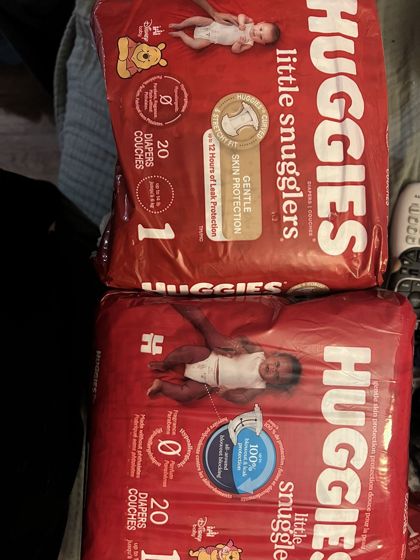 6 packs of size 1 Huggies Diapers
