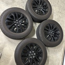 2024 Ford F-150 20 inch black gloss factory wheels