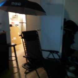 Two Beach chairs with umbrella and cup holder