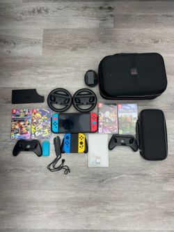 Nintendo Switch OLED Bundle – Neon Console, Extra Joy-Cons, 6 Games, Cases & Racing Wheels!