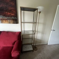 Gold And Glass Bookshelves 