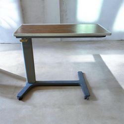 Bedside rolling table