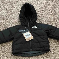 The North Face baby jacket. reversible. size 0-3 months 
