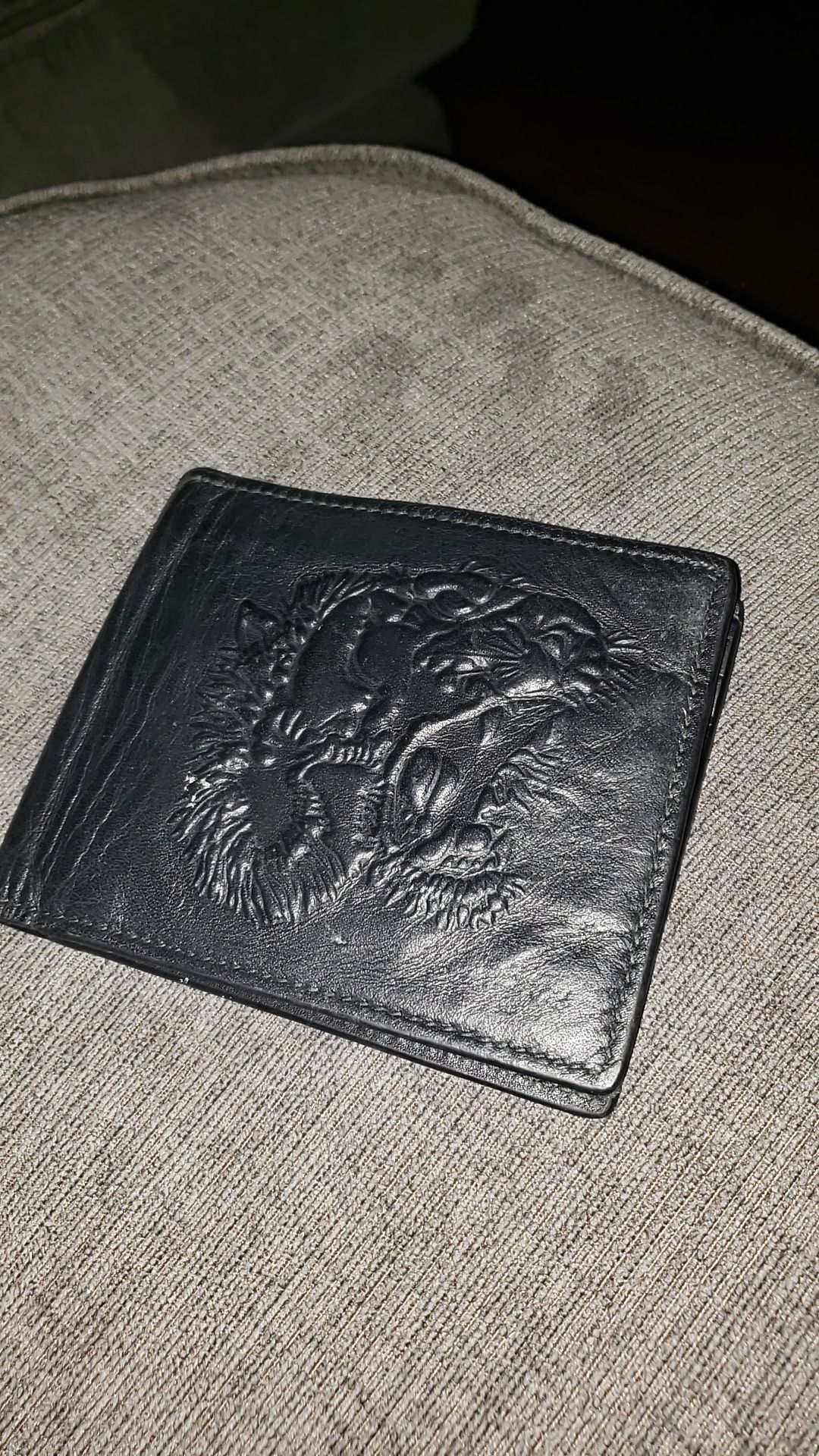 Gucci tiger embossed wallet