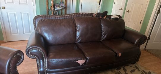 leather couch and chairs
