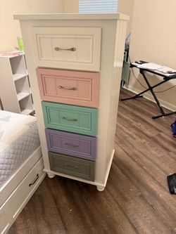 Pastel wood multi color dresser for kids or nursery