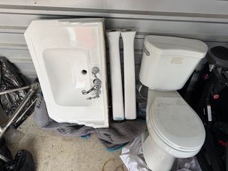 White Bathroom Sink and Toilet Set