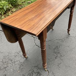 Antique table with dropleaf