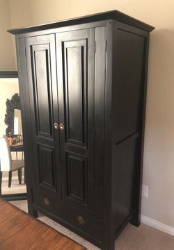 Pier One imports Asian style hutch. Items inside not included. Will need to be picked up not being used. 71’H x 36’W x 23 D