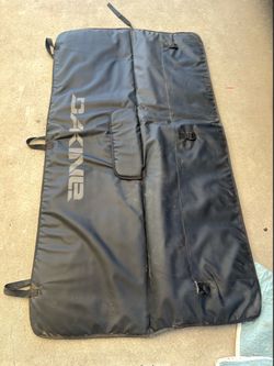 Dakine Pickup Pad DLX, designed to securely transport bicycles over a truck tailgate.