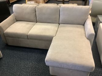 Sleeper sofa w/ Reversible storage chaise