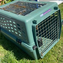 Petmate Double Door deluxe Price 15$.  Pick Up.  E.  72nd.   and.   Grandview.  E.   Tacoma 