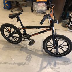 Mongoose Rebel Freestyle Kids BMX Bike, 20-inch mag wheels, 