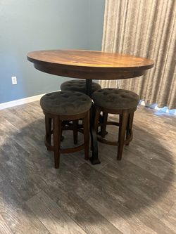 Bar height Table and 3 bar stools