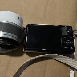 Nikon 1 J1 10.1MP Mirrorless Digital Camera with 30-110mm lens