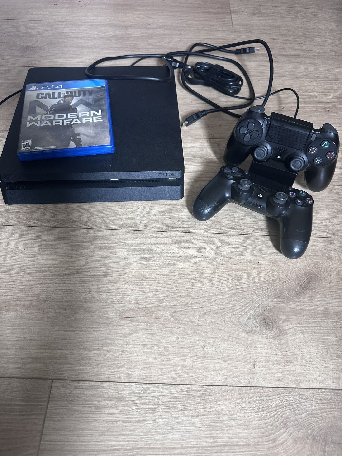 PS4 Slim 1TB, Cables, 2 controllers & 1 game