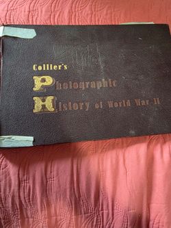 This is an original hardcover copy of Collier's Photographic History of World War II, published by the P.F. Collier & Son Corporation