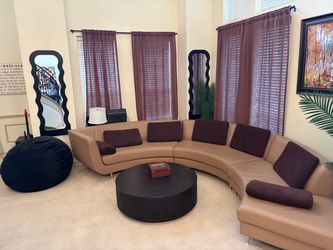 Curved Tan Leather Sectional Sofa
