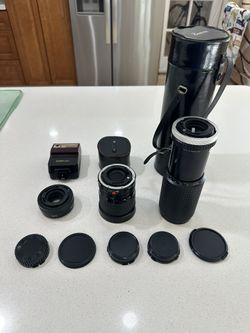 Canon Camera Lenses And Flash, Sold As Is.