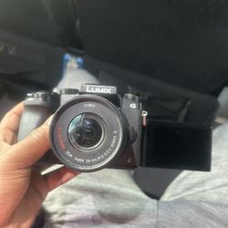Panasonic Lumix G7 w/ 14-42mm + 45-150mm lenses