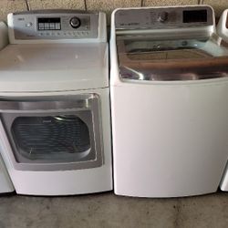 LG MEGA CAPACITY 5.7cu Ft Top Load Washer And Gas Dryer Set 
