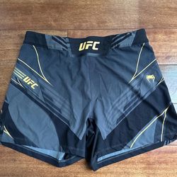 Venum Men's UFC Authentic Fight Night Long Fit Shorts (Black)