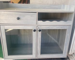 Pictures and cabinet