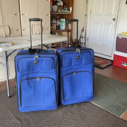 2 used LEISURE brand expandable luggage