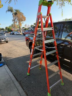 Louisville Ladder- 8 ft. Fiberglass Cross Step Ladder with 300 lbs. Load Capacity Type IA Duty Rating - $80