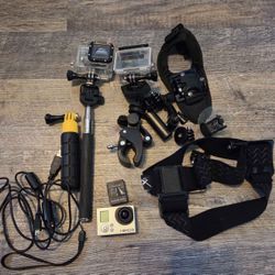 GoPro HERO 3  Action Camera in Great Condition W/ 2 Batteries And accessories