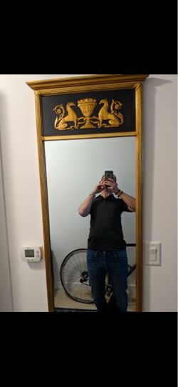Longish mirror with gold leaf
