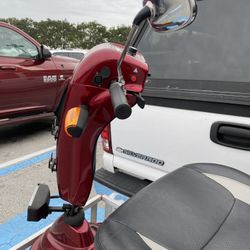 Scooter With The Car Carrier And Ramp