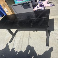 Adjustable height desk