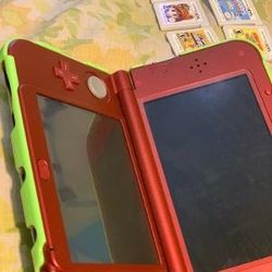 Nintendo 3dsxl - With 8 Games As Shown Mint Condition With Yoshi Clip On Case And Screen Protector Etc