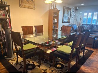 Glass Top Dining Table with 6 Chairs with storage from Wickes furniture