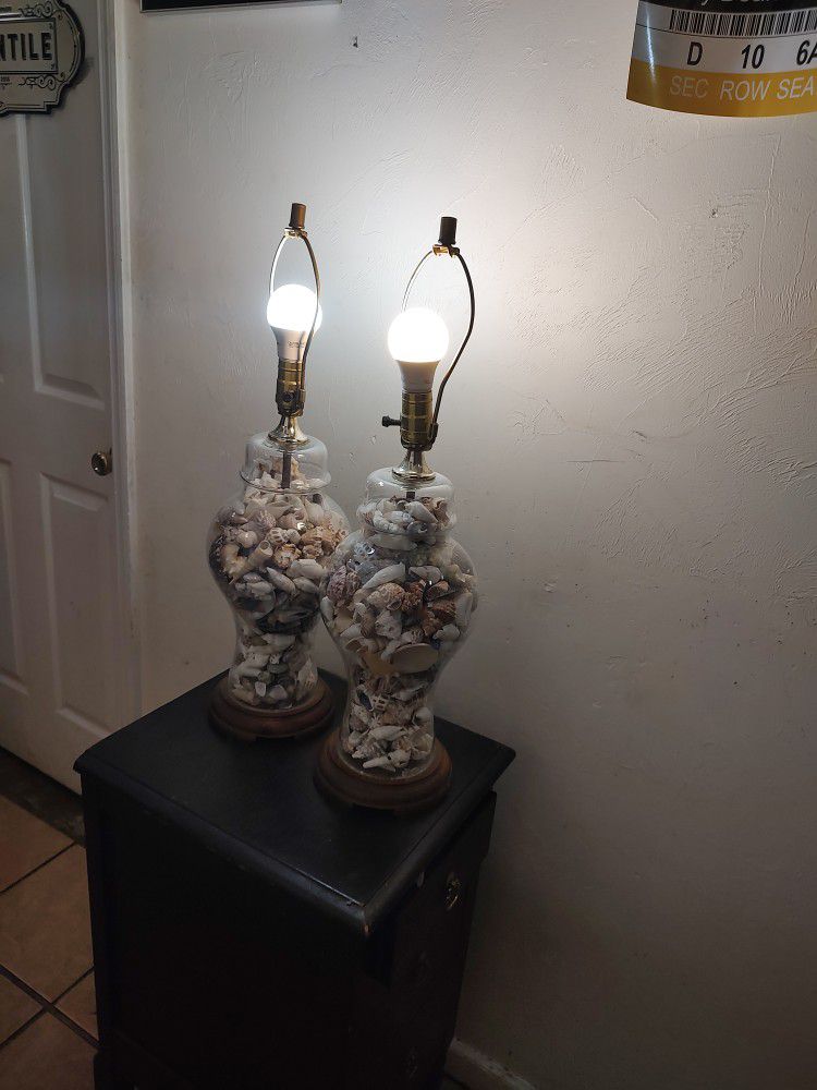 Two Glass Lamps With Bases Full Of Shells