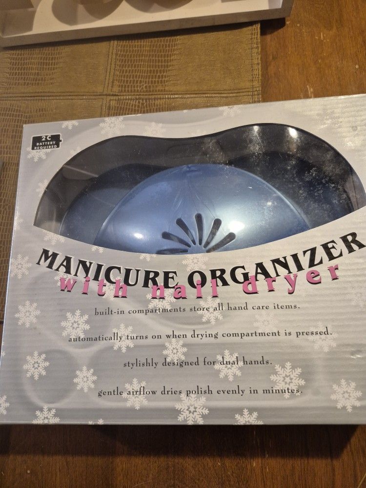 Manicure organizer with hairdryer and twelve piece makeup kit