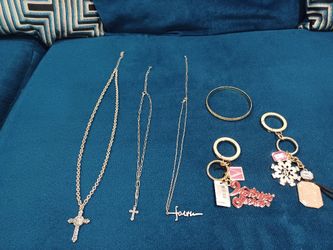 Four Necklace with crucifix, bracelet , and two elegant keychains