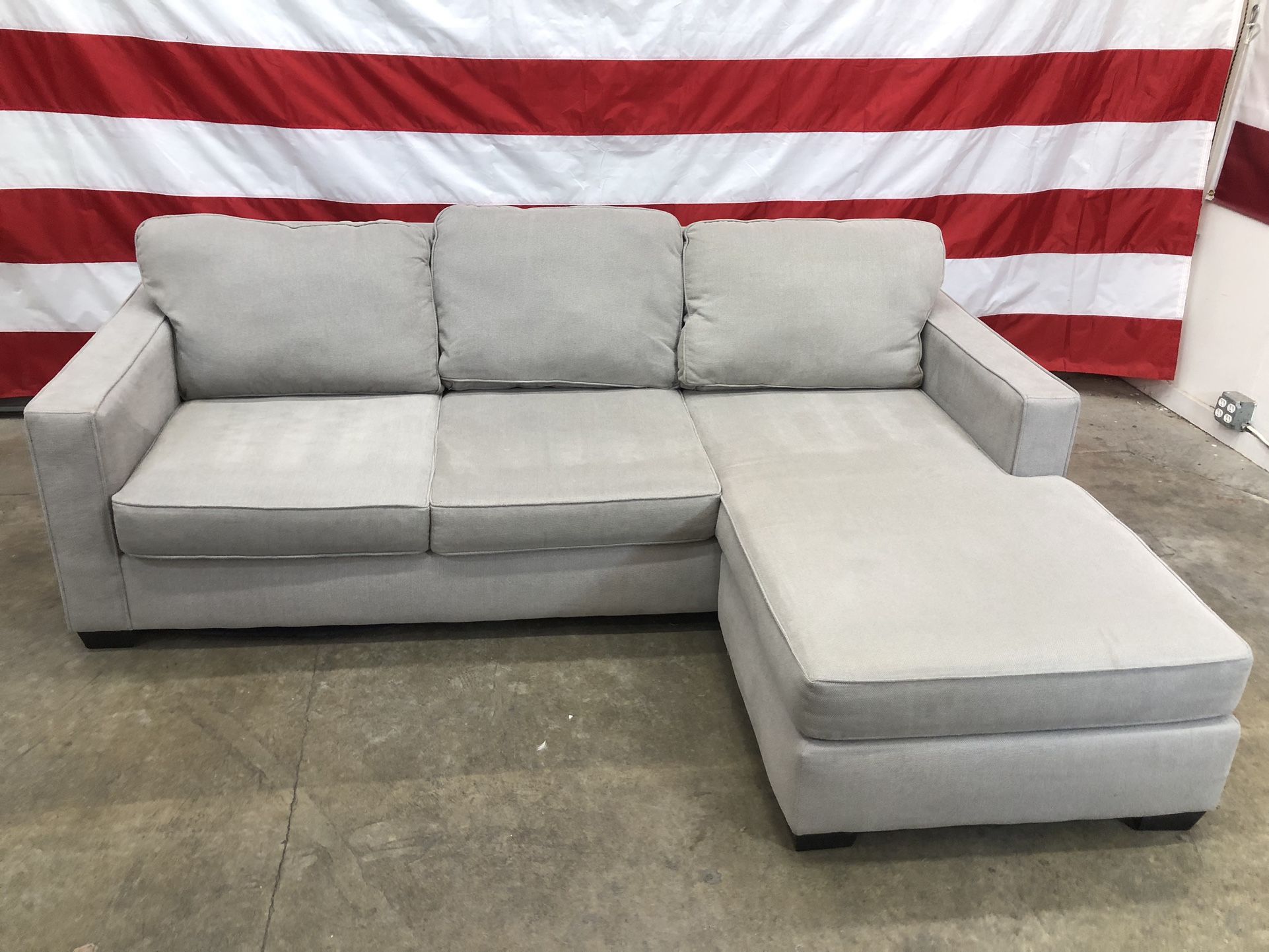 Free Delivery - Living Spaces Couch With Reversible Chase