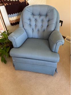 Blue swivel armchair, glider armchair