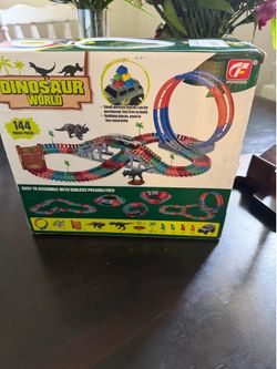 Dinosaur racetrack light up car