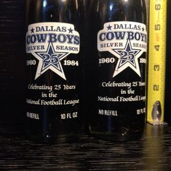 Two vintage Coca-Cola Dallas Cowboys 25th Anniversary (1(contact info removed)) "Silver Season" 10oz glass bottles