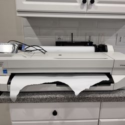 HP DesignJet T100, 2 New Paper Rolls, Less Than 40 Prints , Price Is Firm