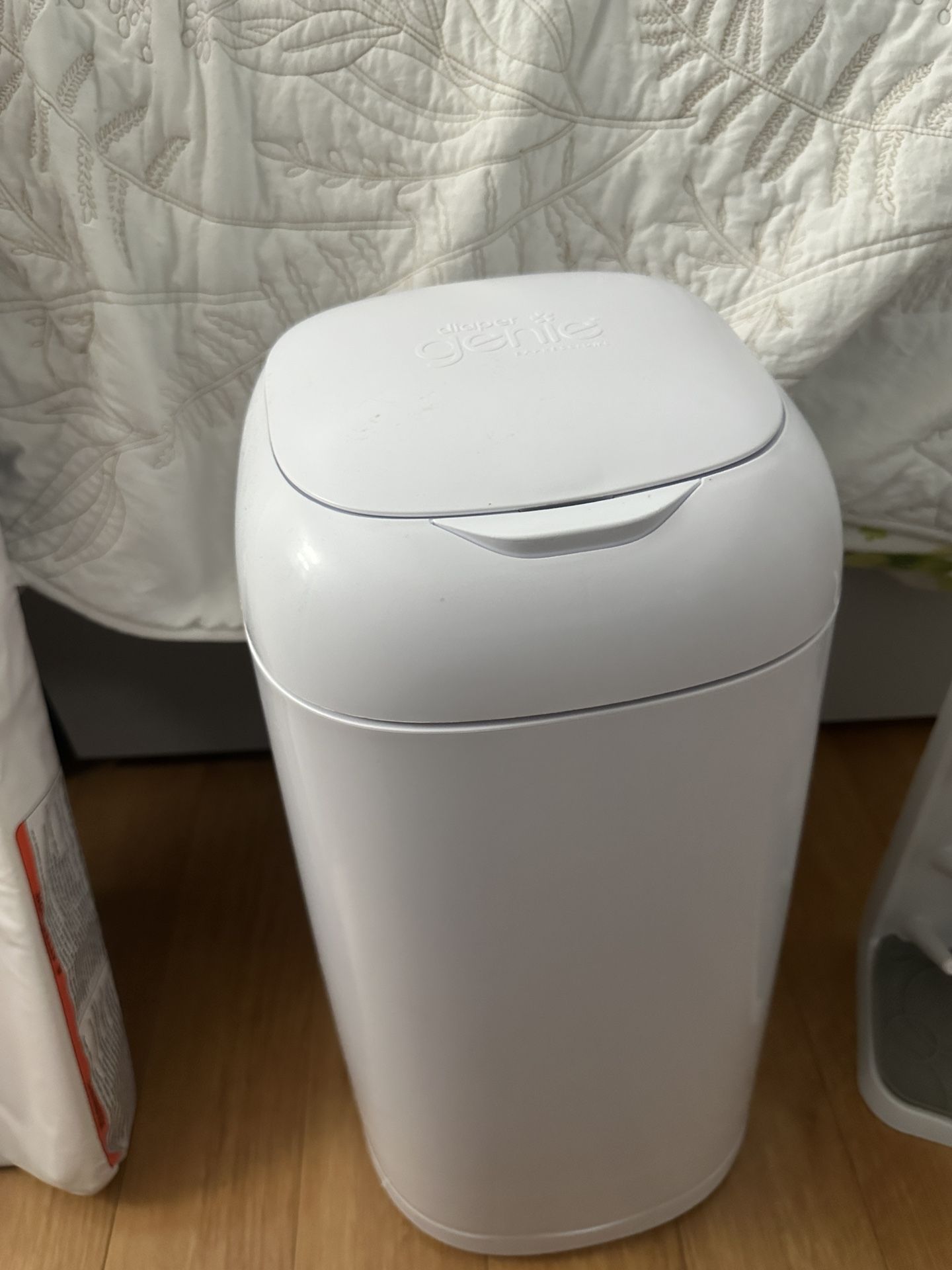 Bundle: Diaper Genie, Changing pad And Muslim Covers
